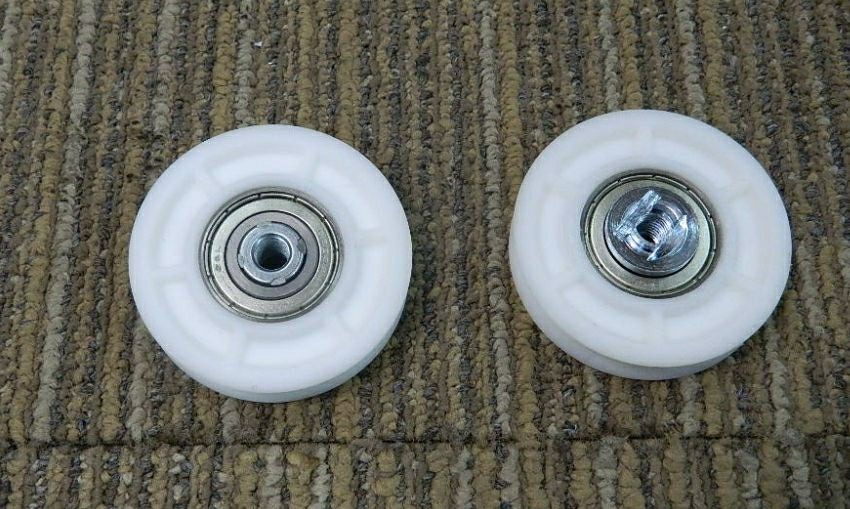 XIZI OTIS HANGER ROLLER
		